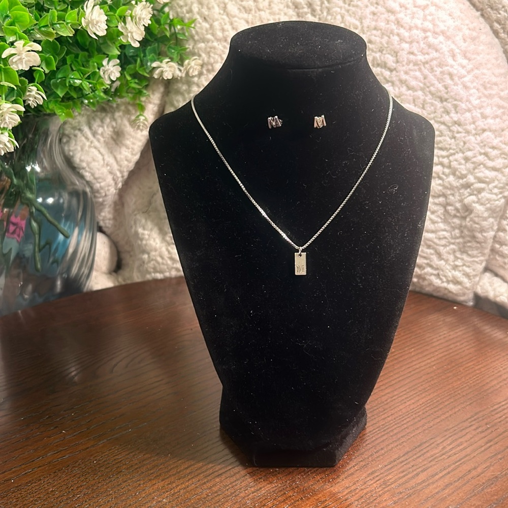 Silver-tone bar necklace with initial “M” and “M” earrings